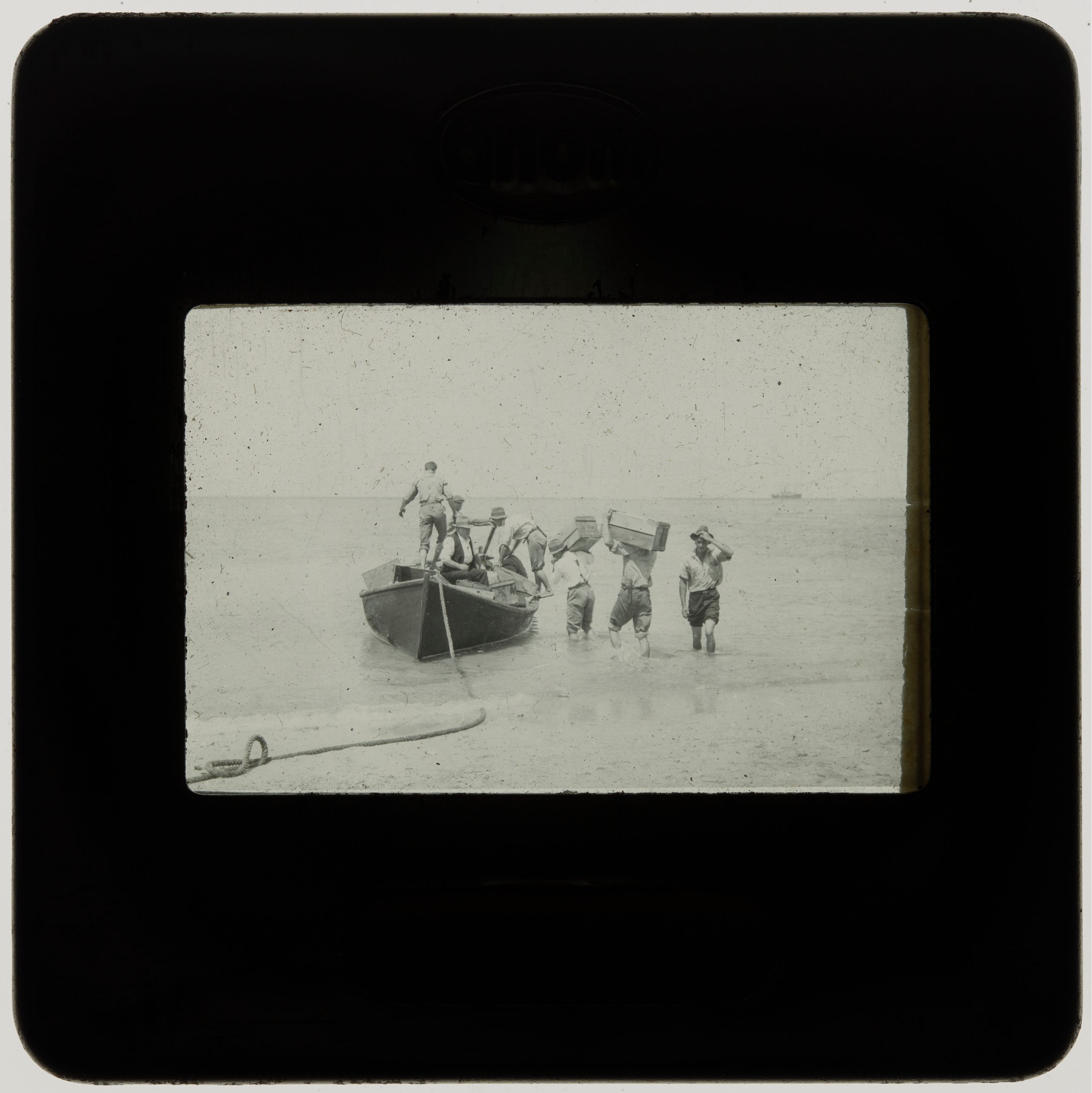 Boxes loaded onto a small rowboat, Lord Howe Island