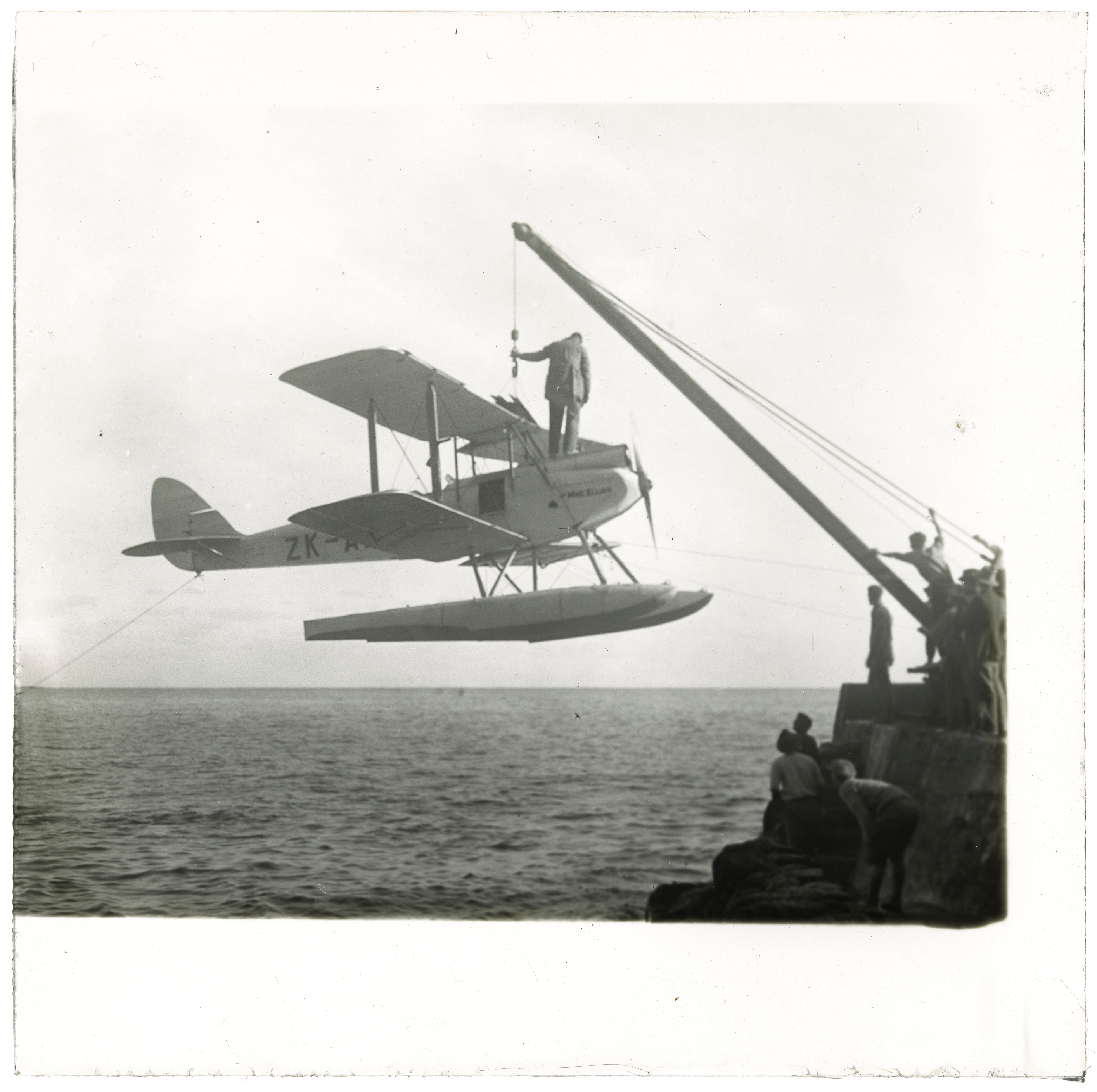 The seaplane 'Madam Elijah' lifted by crane, Norfolk Island