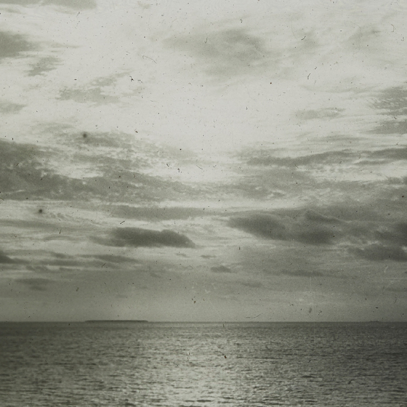 Ocean horizon and cloudy skies