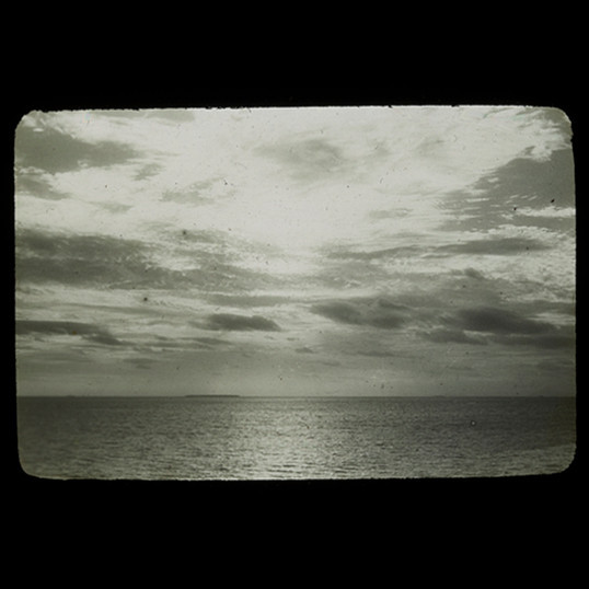 Ocean horizon and cloudy skies