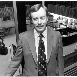 Neil Radford above the foyer to Fisher Library