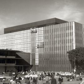 Fisher Library, with bronze cladding of book stack in progress