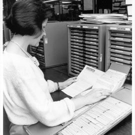 Leona Nock with the Fisher Library Current Serials Record Roneodex. 