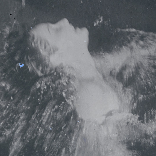 Person breaching surface of the water