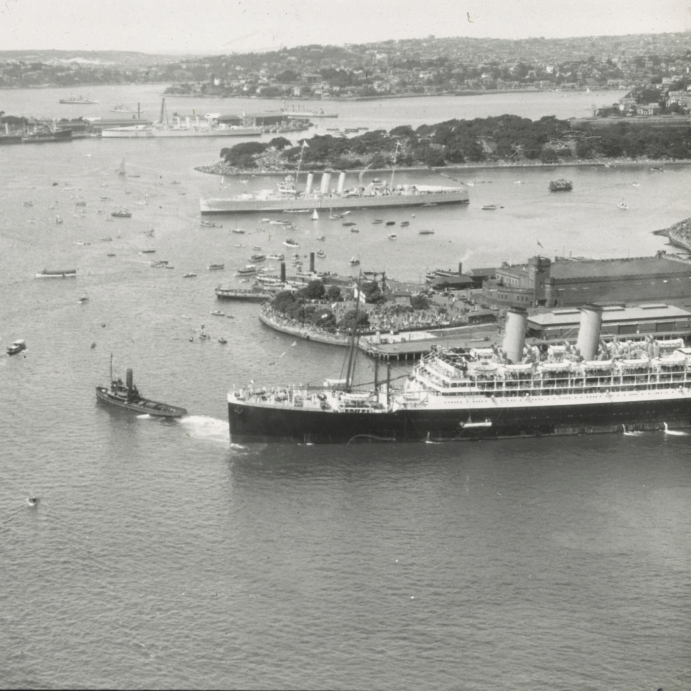 Large ships in the harbour during Sydney Harbour Bridge opening celebrations