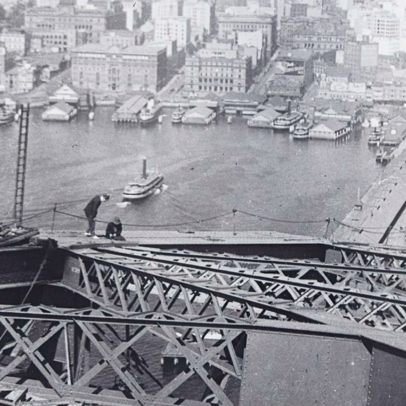 Workers on Sydney Harbour Bridge under construction