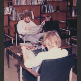 Students using the casual reading area, Fisher Library, 1977