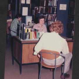 Library enquiries desk, Fisher Library, 1977