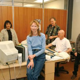 Library staff members in staff area, 2002