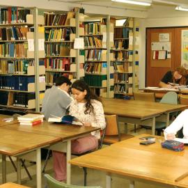 Students at group study tables, 2002