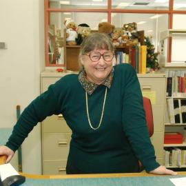 Library staff member at information desk, Nursing Library, 2002