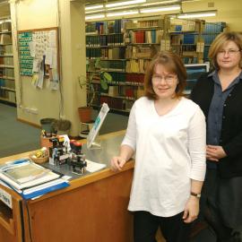 Library staff members at information desk, Camden Library, 2002