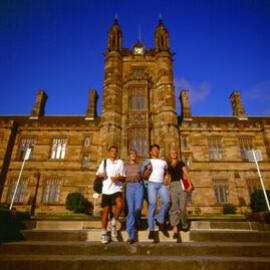 Students in front of the main entrance to the Quadrangle
