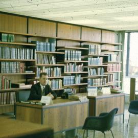 Jack Nelson at the Fisher Library reference desk, 1963