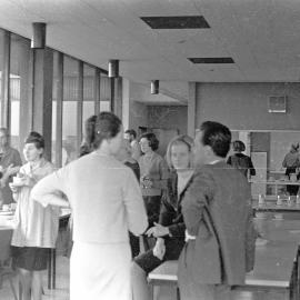 Library staff members in Fisher Library Staff Room and kitchen