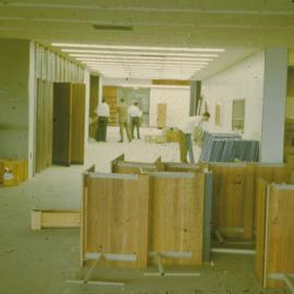 Assembling desks in Fisher Library, Level 3, before moving in, 1962