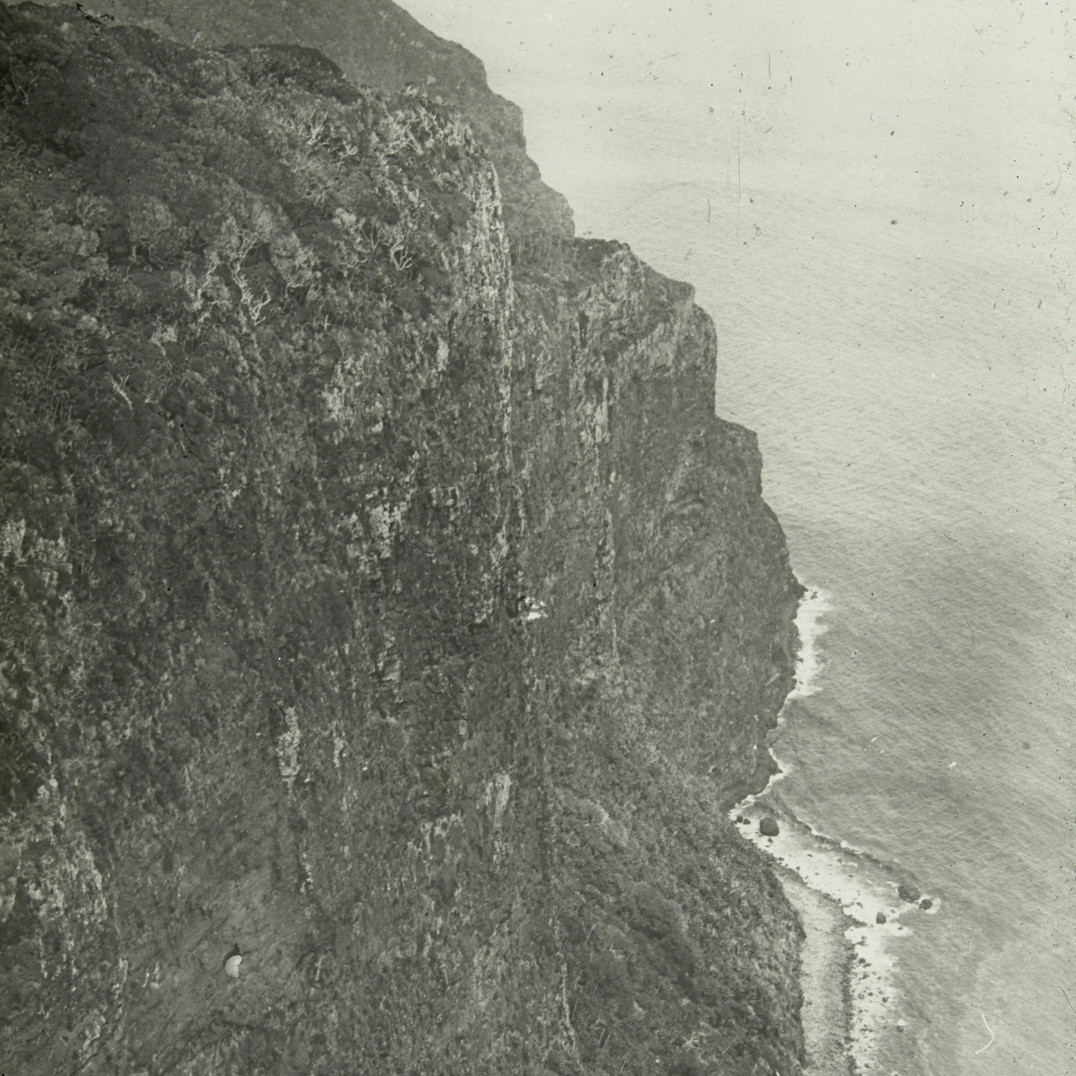 Steep rocky cliffs above the ocean, Lord Howe Island