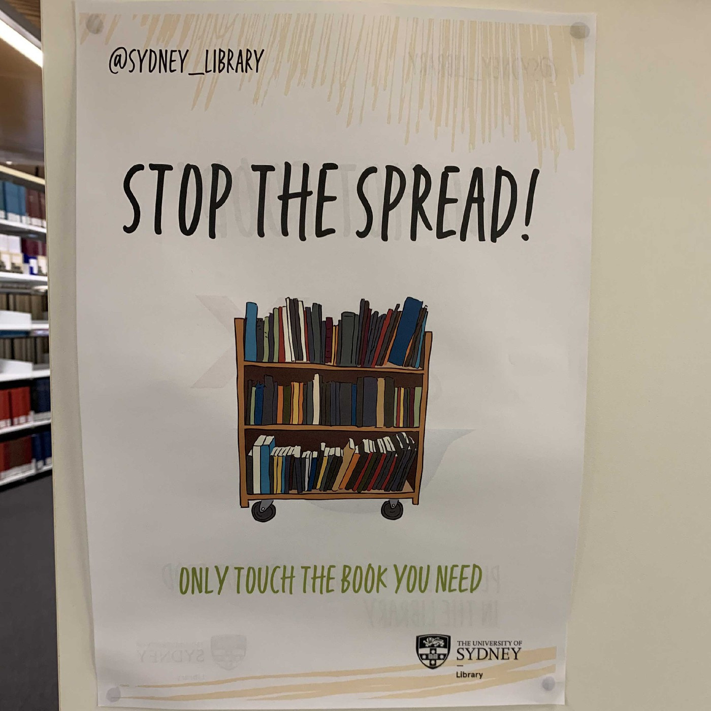 Stop the spread signage at Fisher Library